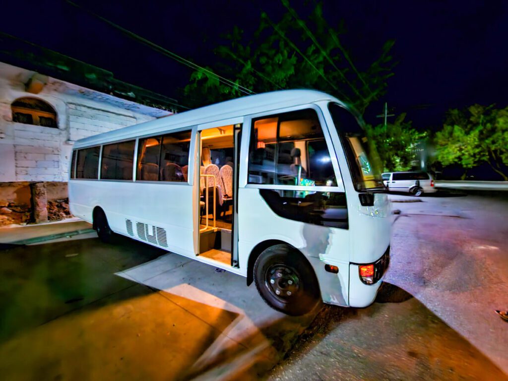 Shuttle vans departing from Antigua to Lake Atitlan on a sunny day