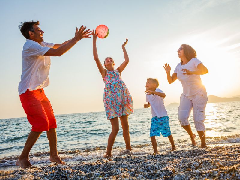 Family enjoying a cultural workshop at Lake Atitlan, illustrating activities cost for families in a Lake Atitlan budget.